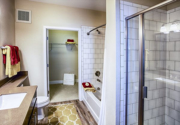 Luxurious bathroom with marble countertops and modern fixtures at RockVue Apartments in Broomfield