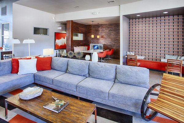 Clubhouse lobby featuring modern decor and spacious seating at RockVue Apartments in Broomfield, perfect for luxury living experience