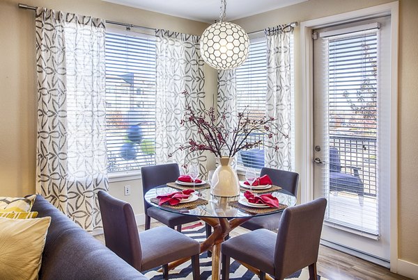 Dining room featuring elegant table setting at RockVue Apartments