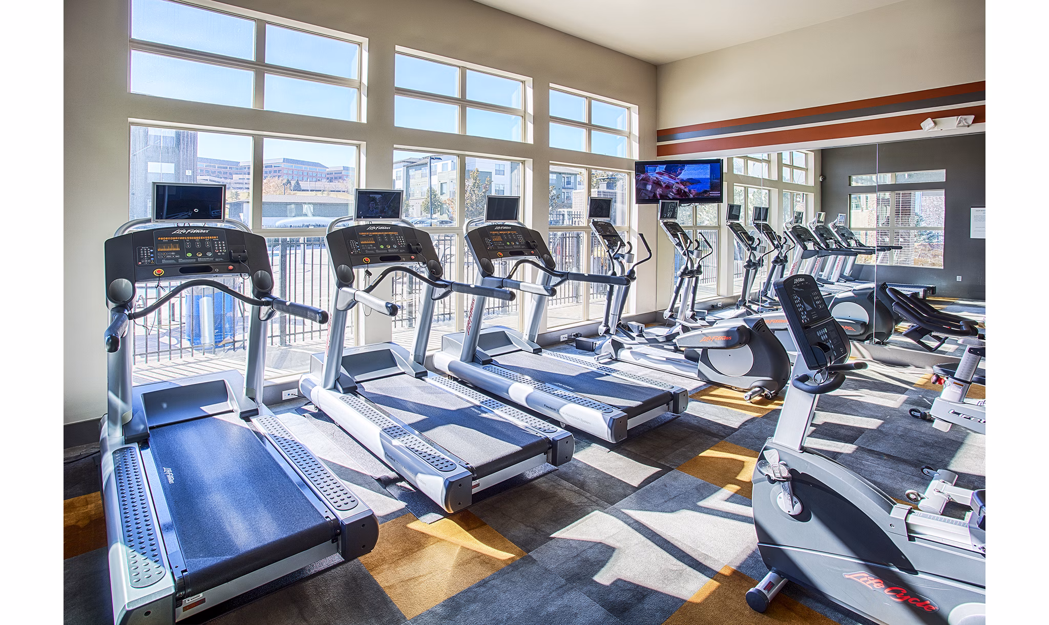 State-of-the-art fitness center with modern equipment at RockVue Apartments