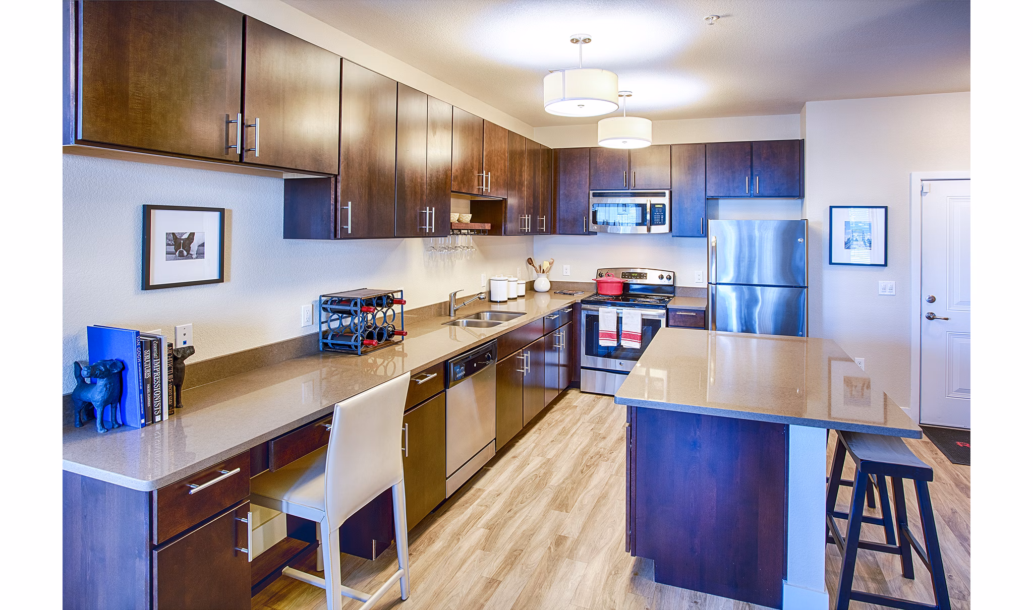 Modern kitchen with stainless steel appliances at RockVue Apartments, a Greystar luxury community