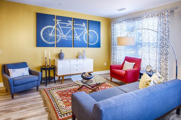 Spacious living room with modern decor at RockVue Apartments, Greystar luxury apartments in a vibrant Louisville neighborhood