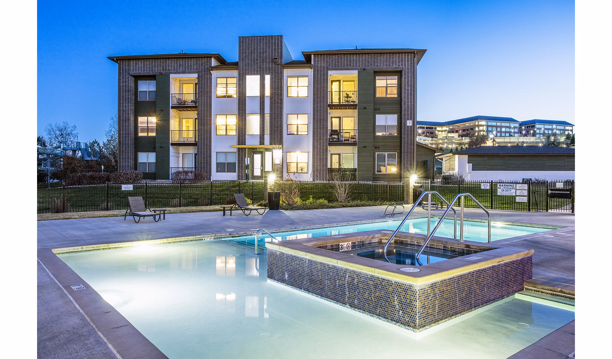 Inviting hot tub area at RockVue Apartments, perfect for relaxation and leisure activities in a luxurious setting