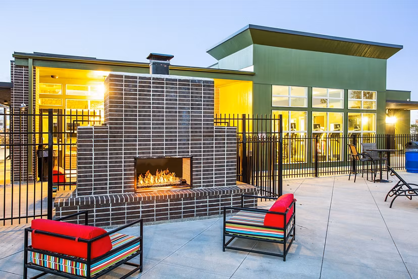 Cozy fire pit at RockVue Apartments, Broomfield, offering luxury outdoor seating and relaxation for residents