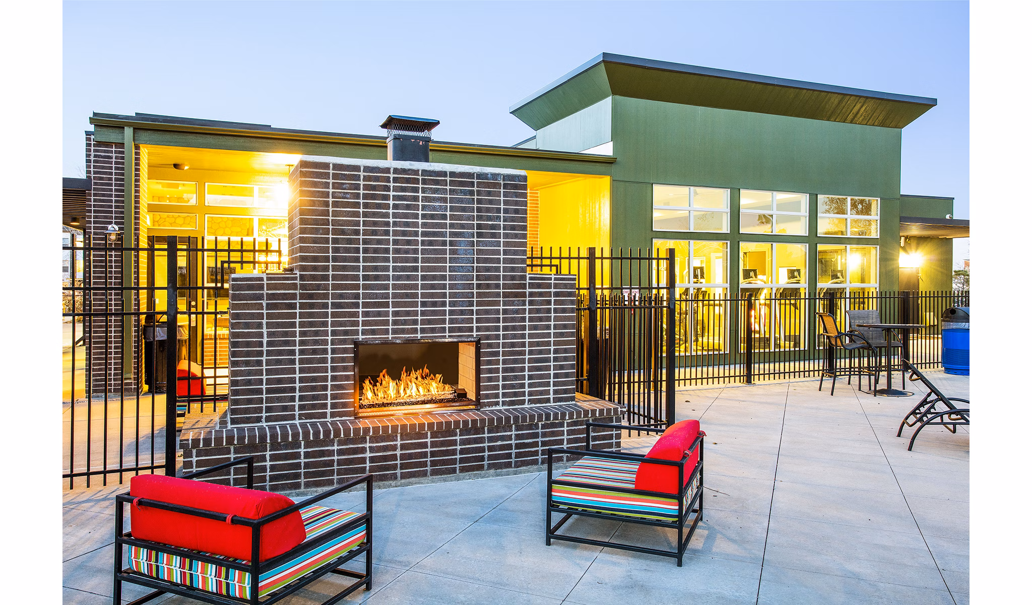 Cozy fire pit at RockVue Apartments, Broomfield, offering luxury outdoor seating and relaxation for residents