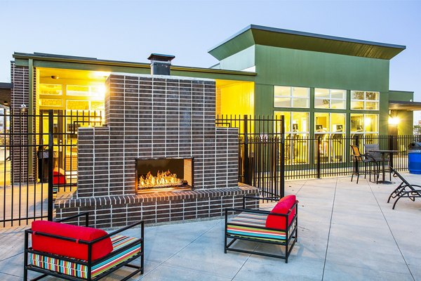 Cozy fire pit at RockVue Apartments, Broomfield, offering luxury outdoor seating and relaxation for residents