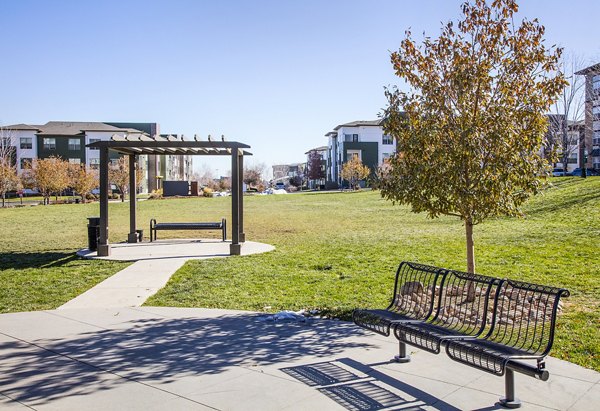 RockVue Apartments: Scenic courtyard with lush landscaping in Broomfield