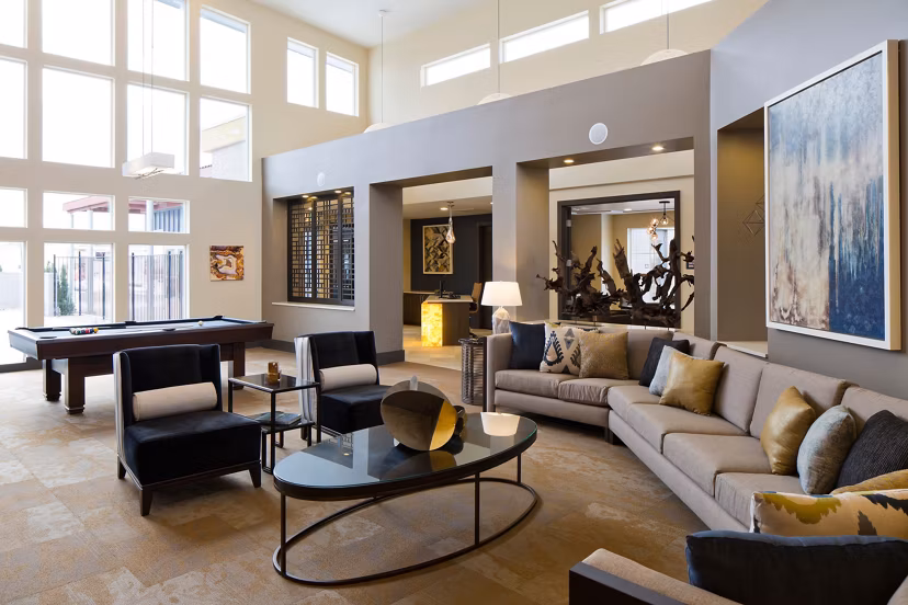 Clubhouse featuring stylish seating and vibrant decor at Pearl DTC Apartments