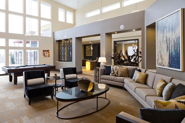Clubhouse featuring stylish seating and vibrant decor at Pearl DTC Apartments