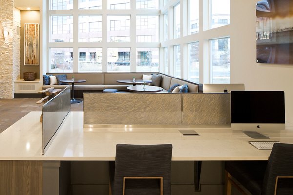 Clubhouse featuring modern design and lounge areas at Pearl DTC Apartments