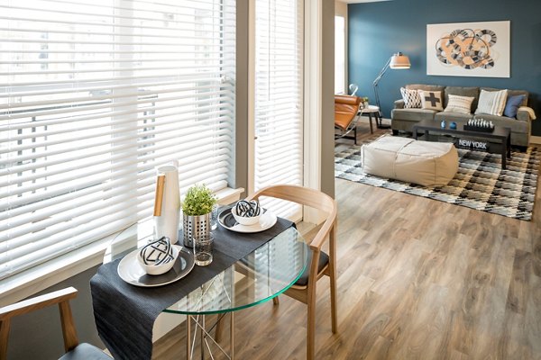 Dining area with elegant furnishings at Pearl DTC Apartments, offering luxury living in a prime location