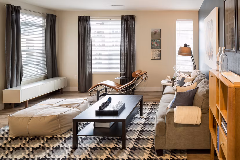 Modern living room with a sleek design and abundant natural light at Pearl DTC Apartments in Denver