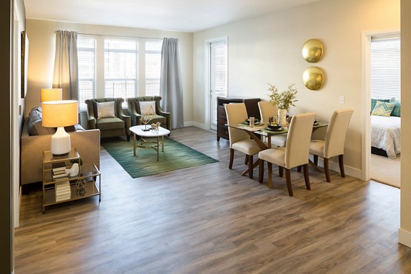 Spacious living room with modern decor at Pearl DTC Apartments