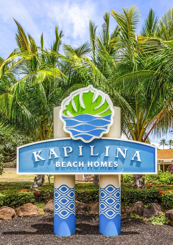 Signage at Kapilina Beach Homes Apartments, showcasing the community entrance with coastal-inspired design elements