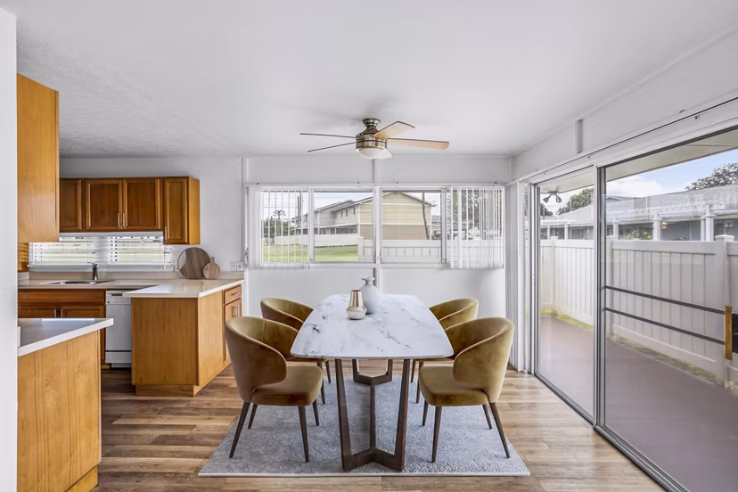 Elegant dining room with ocean views at Kapilina Beach Homes Apartments
