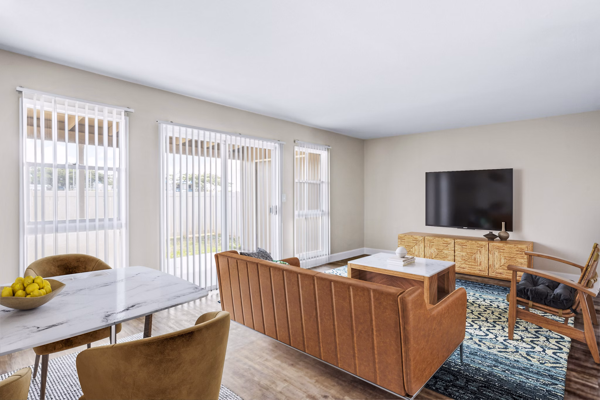 Spacious living room with beach-inspired decor in Kapilina Beach Homes Apartments
