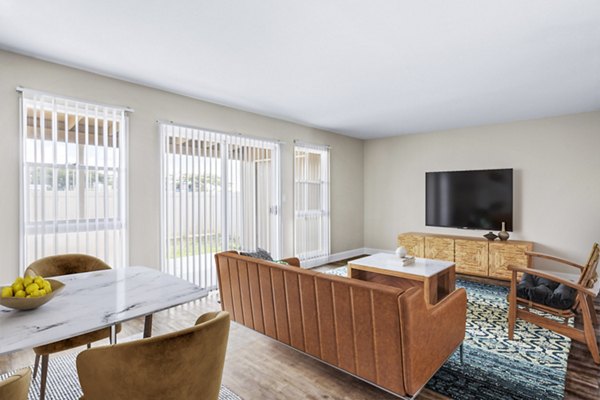 Spacious living room with beach-inspired decor in Kapilina Beach Homes Apartments