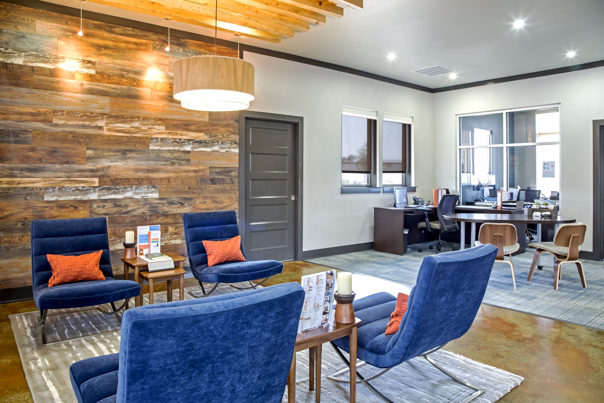 Clubhouse with modern design and cozy seating at Watervue Apartments