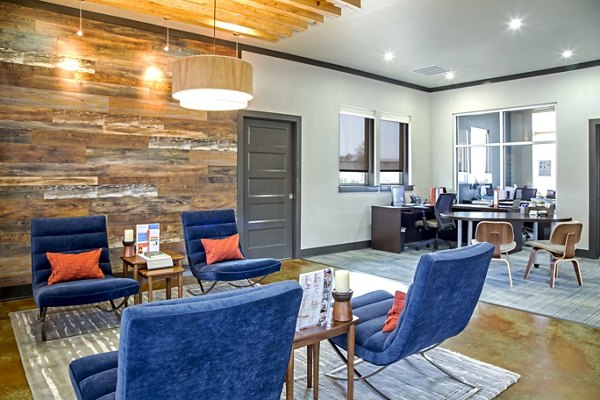 Clubhouse with modern design and cozy seating at Watervue Apartments
