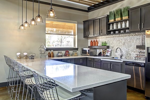 Clubhouse with modern decor and recreational spaces at Watervue Apartments