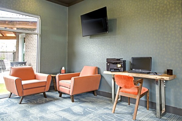 Elegant clubhouse with modern furnishings at Watervue Apartments offering a luxurious social space for residents