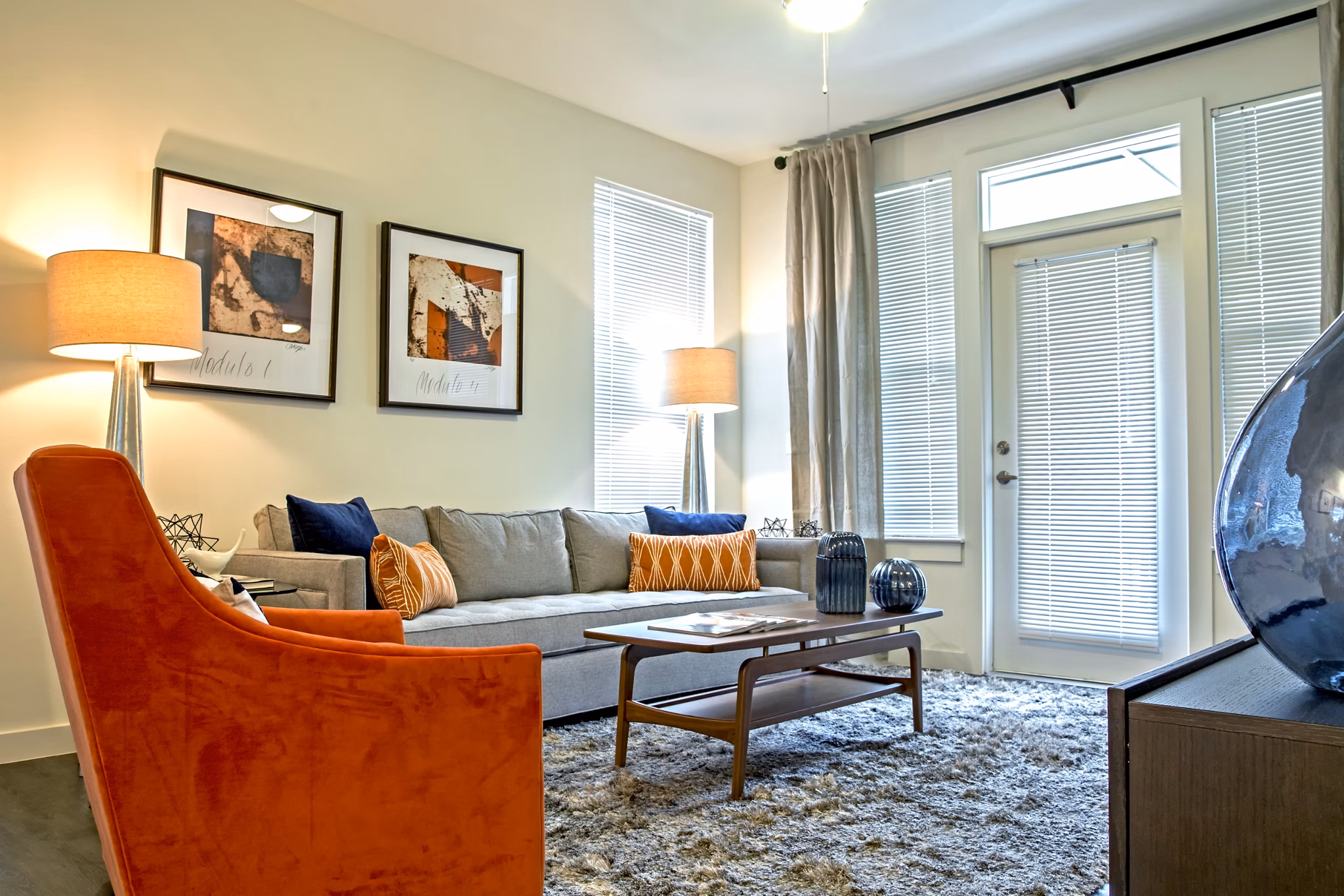Spacious living room with modern decor in Watervue Apartments