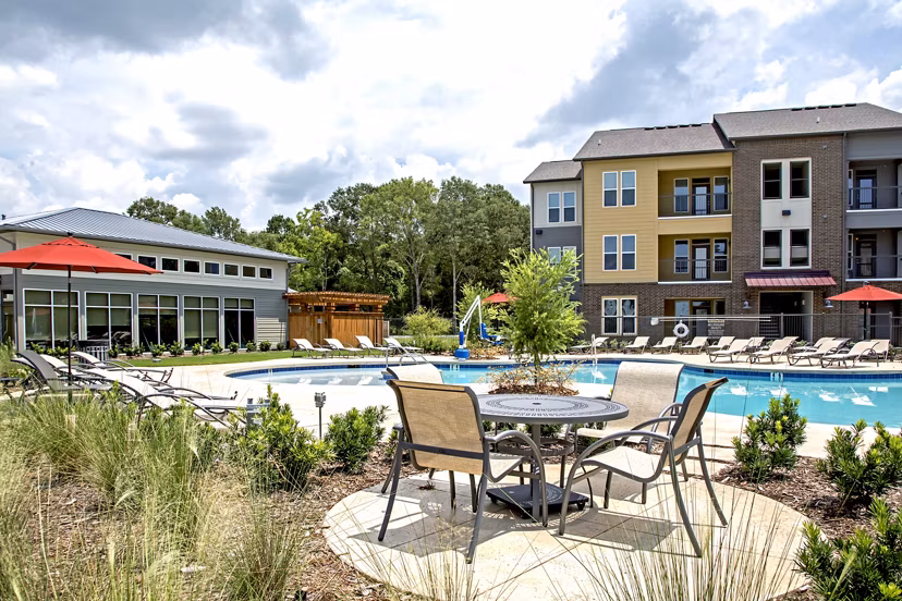 Infinity-edge pool at Watervue Apartments offering luxury relaxation spaces for residents