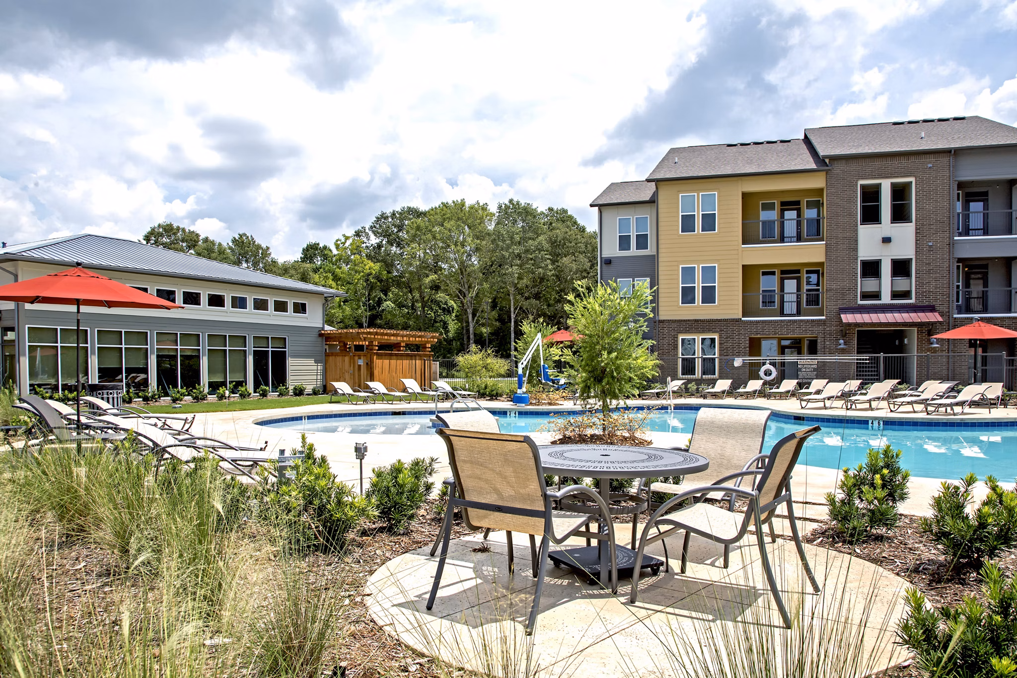 Infinity-edge pool at Watervue Apartments offering luxury relaxation spaces for residents