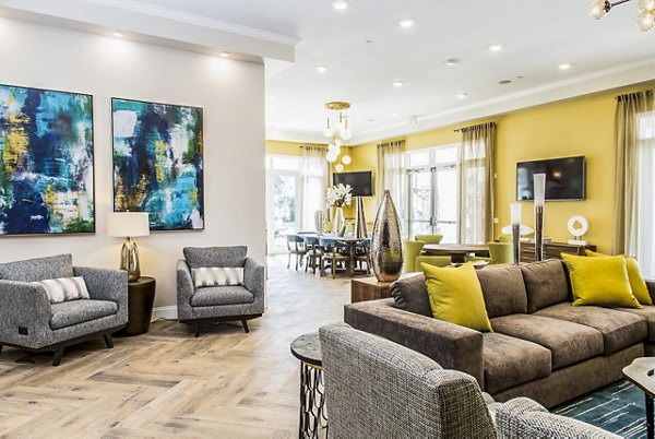 Modern clubhouse lobby with sleek furnishings at Dylan Point Loma Apartments