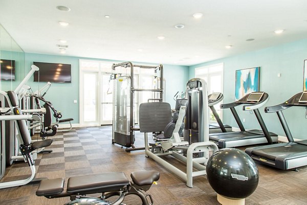 Fully-equipped fitness center with state-of-the-art machines at Dylan Point Loma Apartments