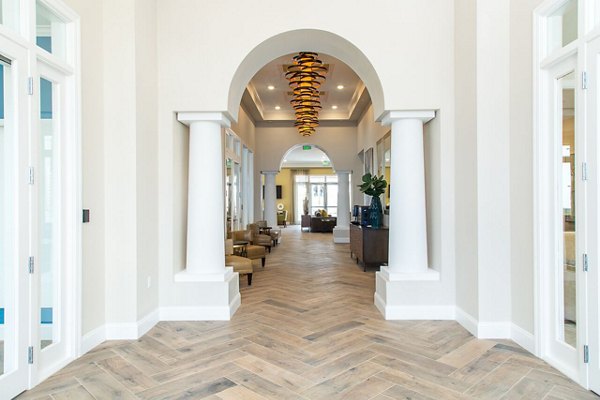 Welcoming clubhouse lobby with modern decor at Dylan Point Loma Apartments, offering luxury amenities in San Diego