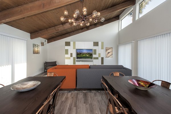 Clubhouse with modern furnishings at Sheridan Park Apartments, a Greystar luxury property
