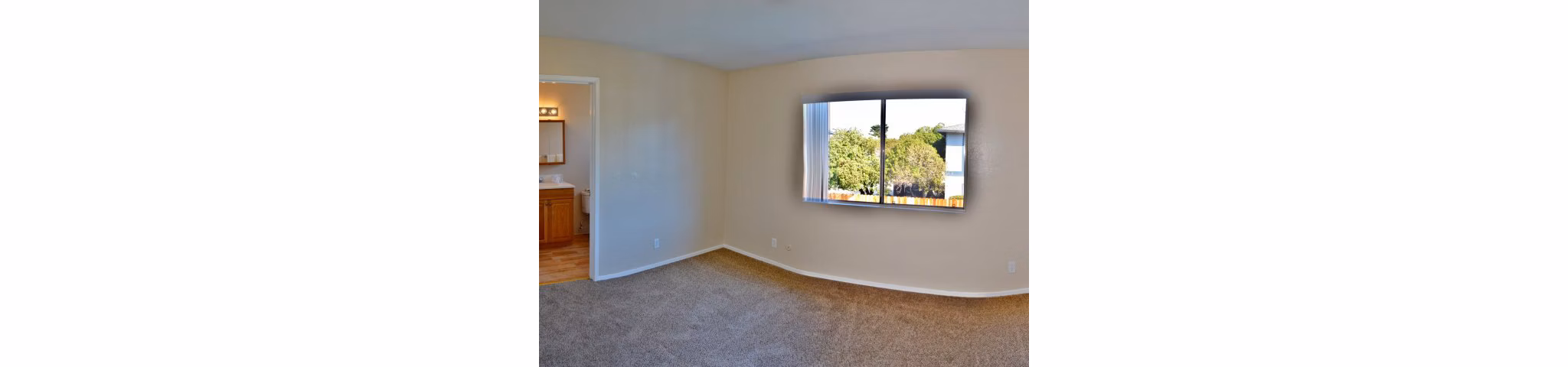 Cozy bedroom with ocean views at Marina Crescent Apartments