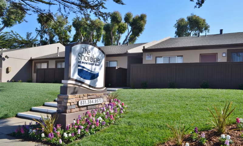 Shoreline Apartments: Stylish modern signage for luxury apartments by the waterfront