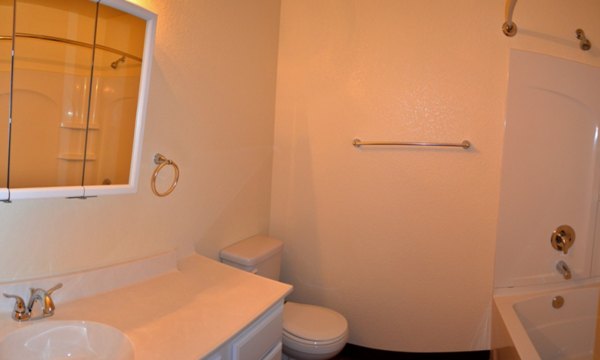 Bathroom featuring modern fixtures at Shoreline Apartments, by Greystar