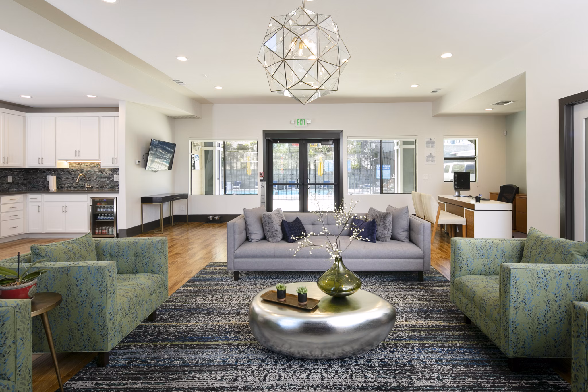 Clubhouse featuring modern design and comfortable seating at Waterscape Apartments, ideal for community gatherings and relaxation