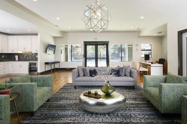Clubhouse featuring modern design and comfortable seating at Waterscape Apartments, ideal for community gatherings and relaxation