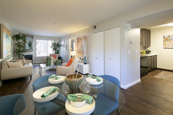 Dining area featuring modern decor and pendant lighting at Waterscape Apartments