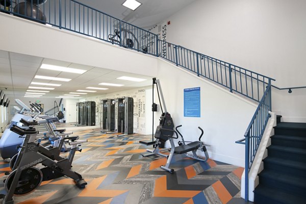 Fitness center with modern equipment at Waterscape Apartments