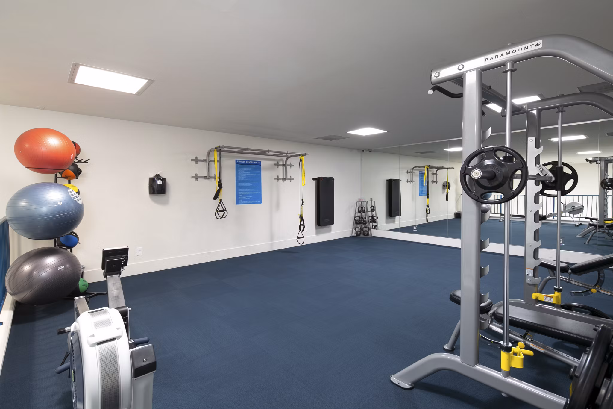 Modern fitness center with state-of-the-art equipment at Waterscape Apartments, ideal for residents seeking an active lifestyle