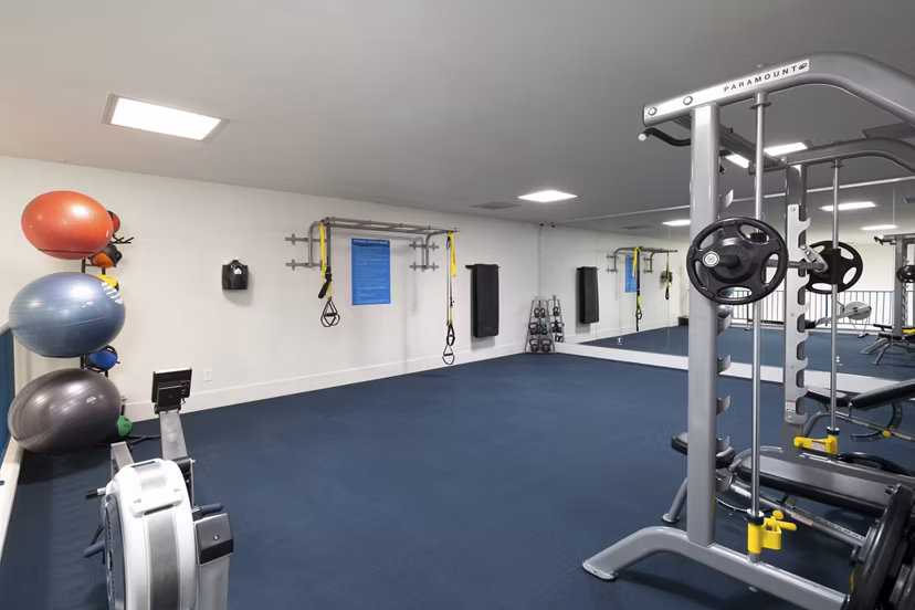 Modern fitness center with state-of-the-art equipment at Waterscape Apartments, ideal for residents seeking an active lifestyle