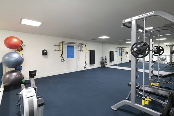 Modern fitness center with state-of-the-art equipment at Waterscape Apartments, ideal for residents seeking an active lifestyle