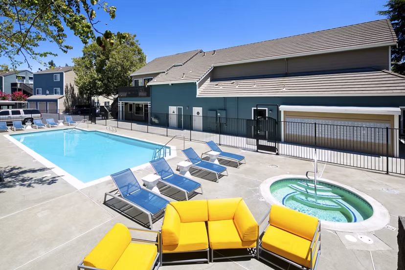 Expansive pool with lounge area at Waterscape Apartments, Greystar luxury apartments