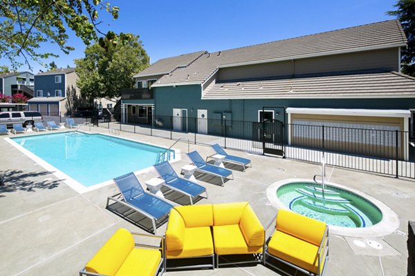 Expansive pool with lounge area at Waterscape Apartments, Greystar luxury apartments