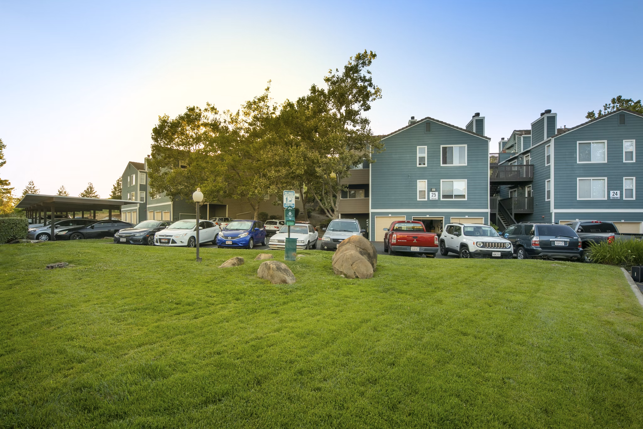 Pet-friendly dog park with agility equipment at Waterscape Apartments