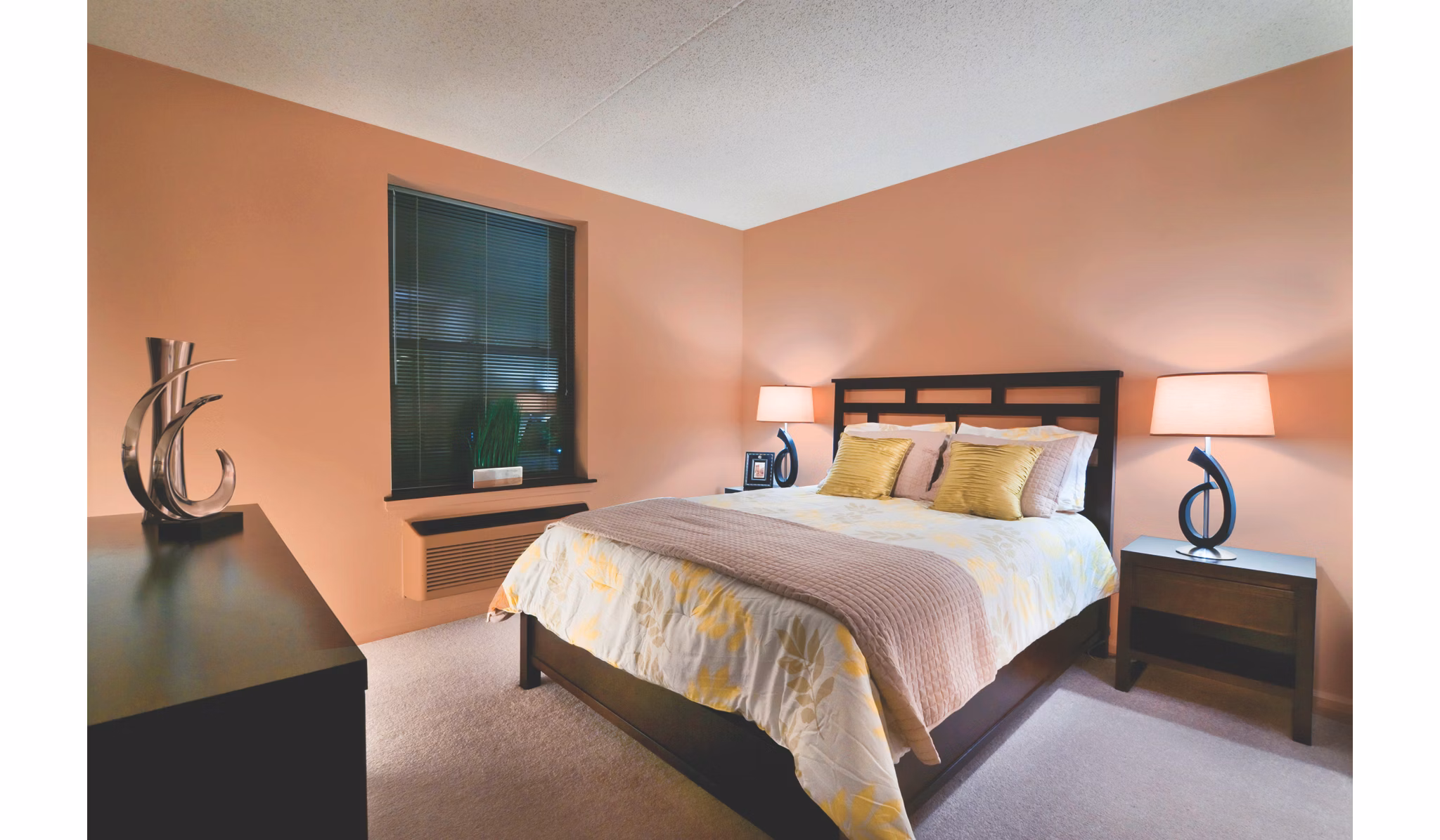 Modern bedroom with large windows at Chancery Square Apartments, offering luxury living spaces in a prime location