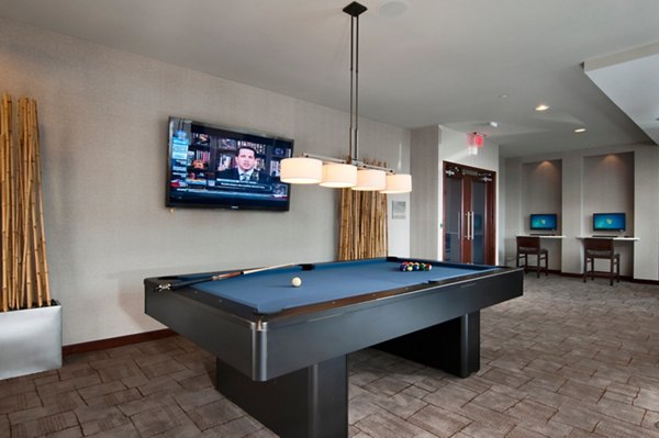 Clubhouse featuring modern furnishings and social spaces at Chancery Square Apartments