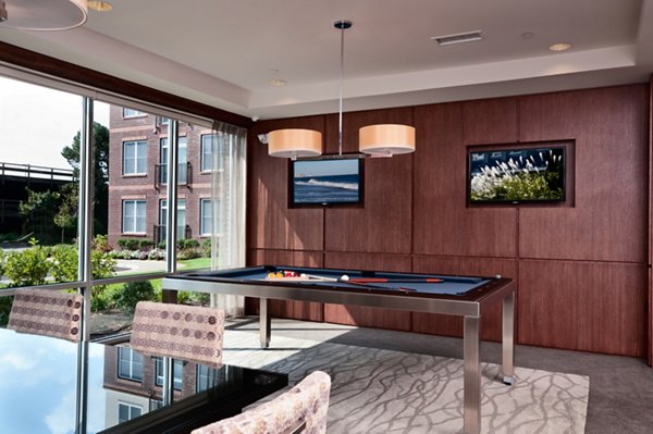 Clubhouse featuring modern design and comfortable seating at Osprey Cove Apartments