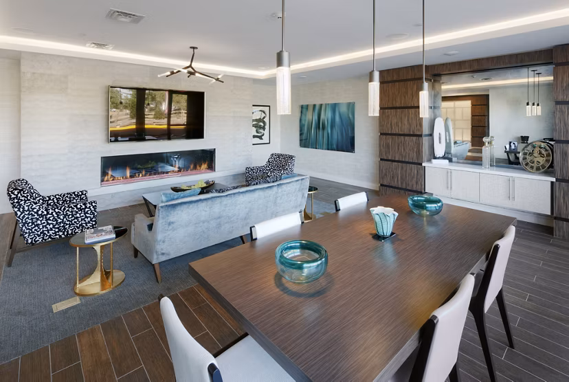 Clubhouse featuring modern amenities including a lounge and entertainment space at Osprey Cove Apartments