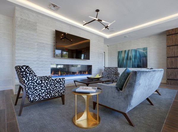 Clubhouse with modern furnishings and entertainment spaces at Osprey Cove Apartments